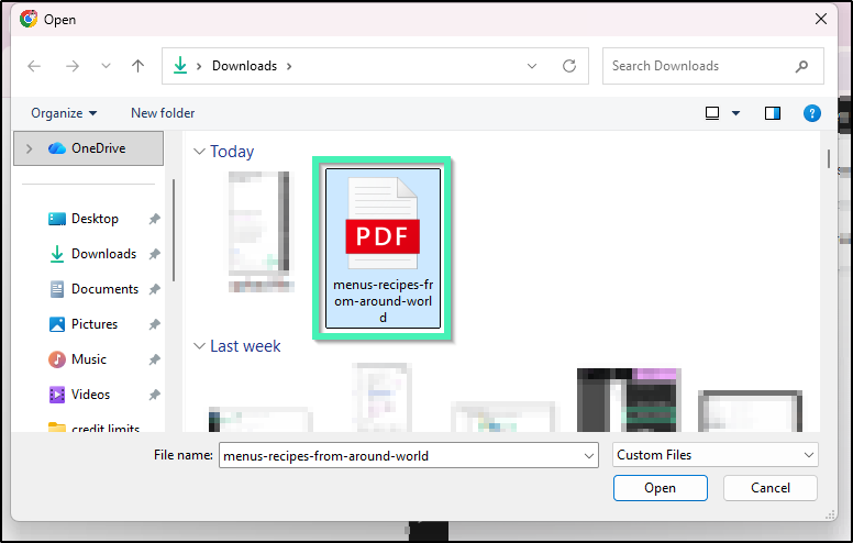 Operating system file picker window selecting a PDF document named menus-recipes-from-around-world for upload into Angie