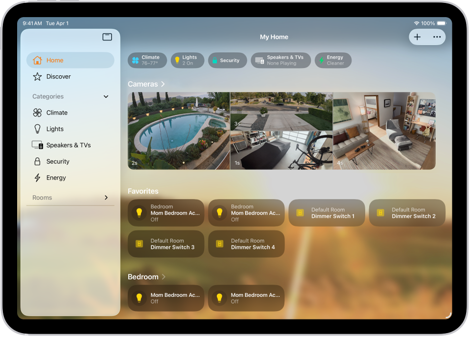 The Home app with the sidebar on the left, showing Home, Automation, and Discover tabs near the top left. Categories and Rooms in the home appear below. To the right of the sidebar, at the top, are the Intercom, Add, and More Options buttons. Category buttons appear near the top. Below that are scenes, camera images, and a room with its accessories.