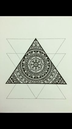 a black and white drawing of a triangle with an intricate design in the middle, on a sheet of paper