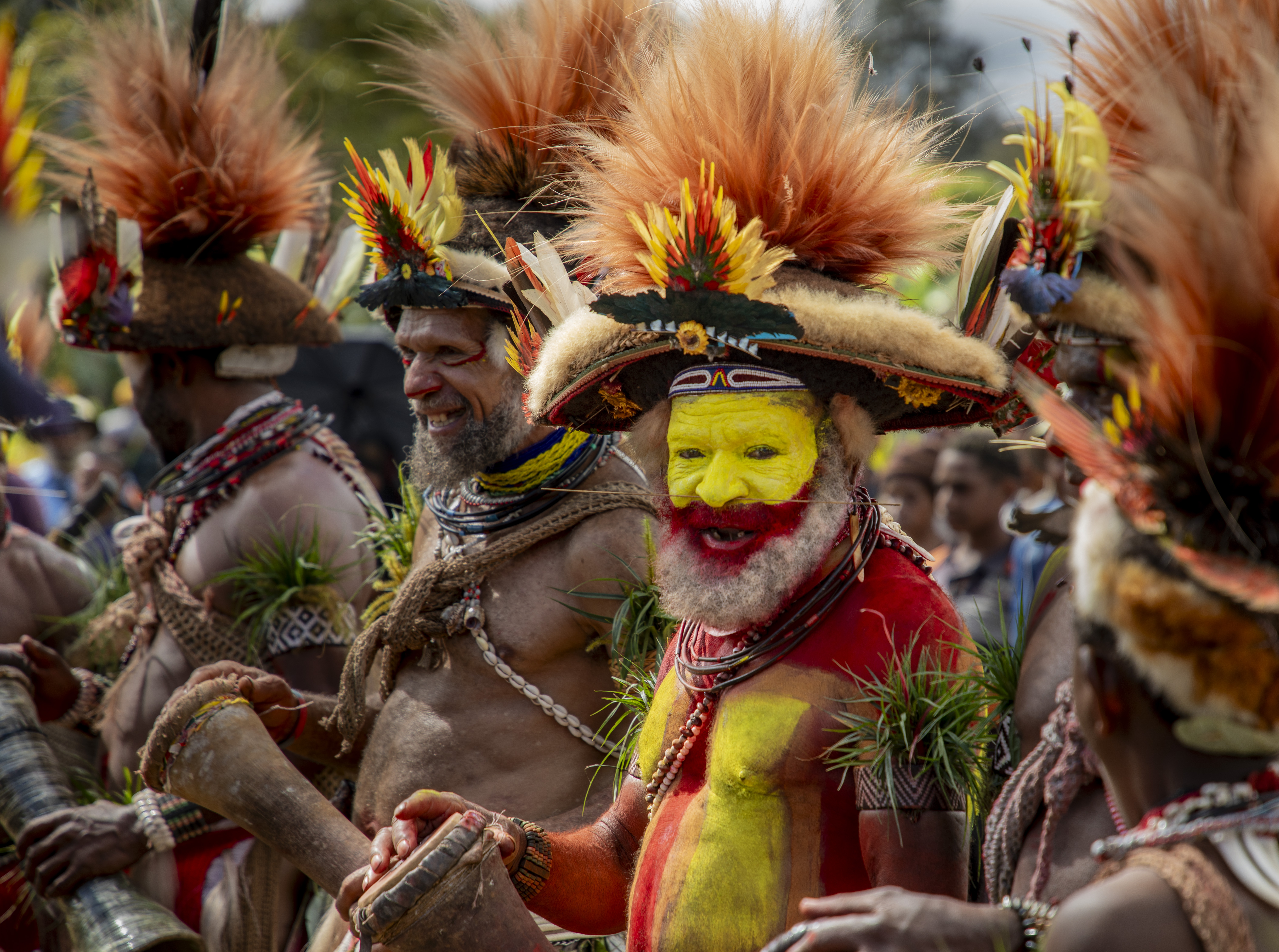 A photograph showing people dressed in traditional attire